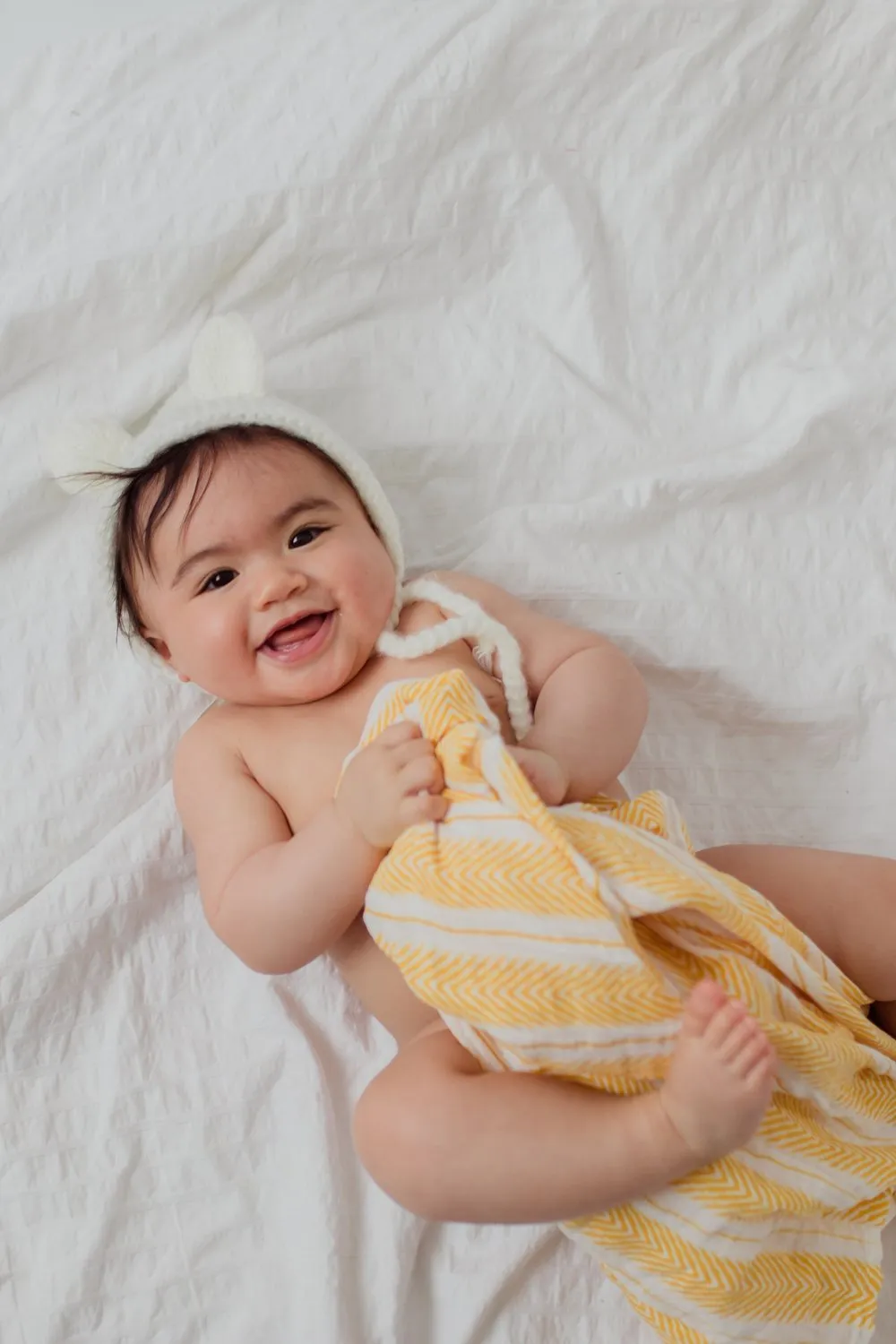 MUSTARD HERRINGBONE SWADDLE